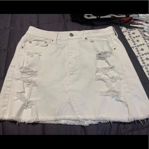 white ripped jean skirt